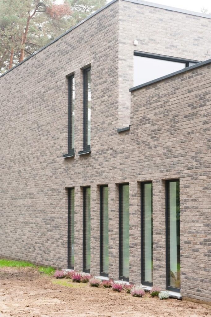 Exterieur geveldeel met verticale latten &mdash; woning Dillen, Nijlen
