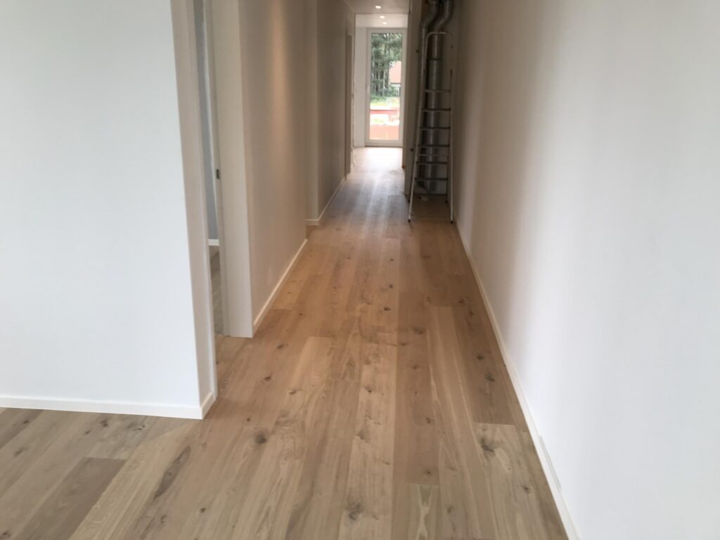 Lege gang in afwerkingsfase &mdash; woning Dickens, Oud-Turnhout