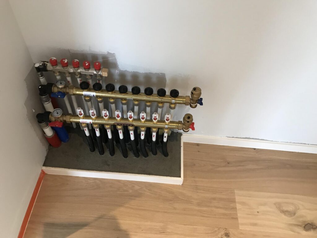 Technische ruimte met verwarmingsinstallatie &mdash; woning Dickens, Oud-Turnhout